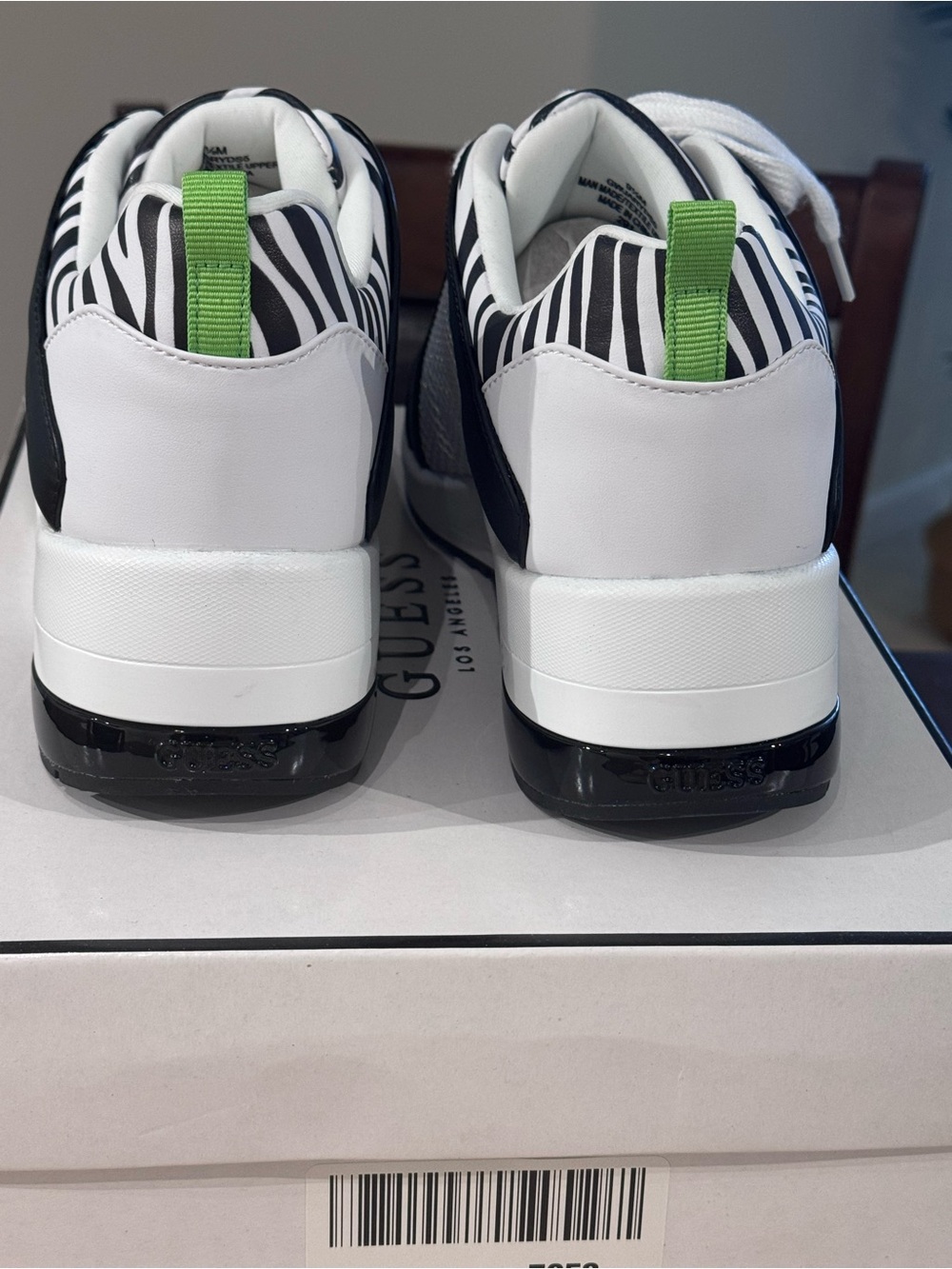 Guess White Sneakers with Zebra Accents and Green Pull Tabs